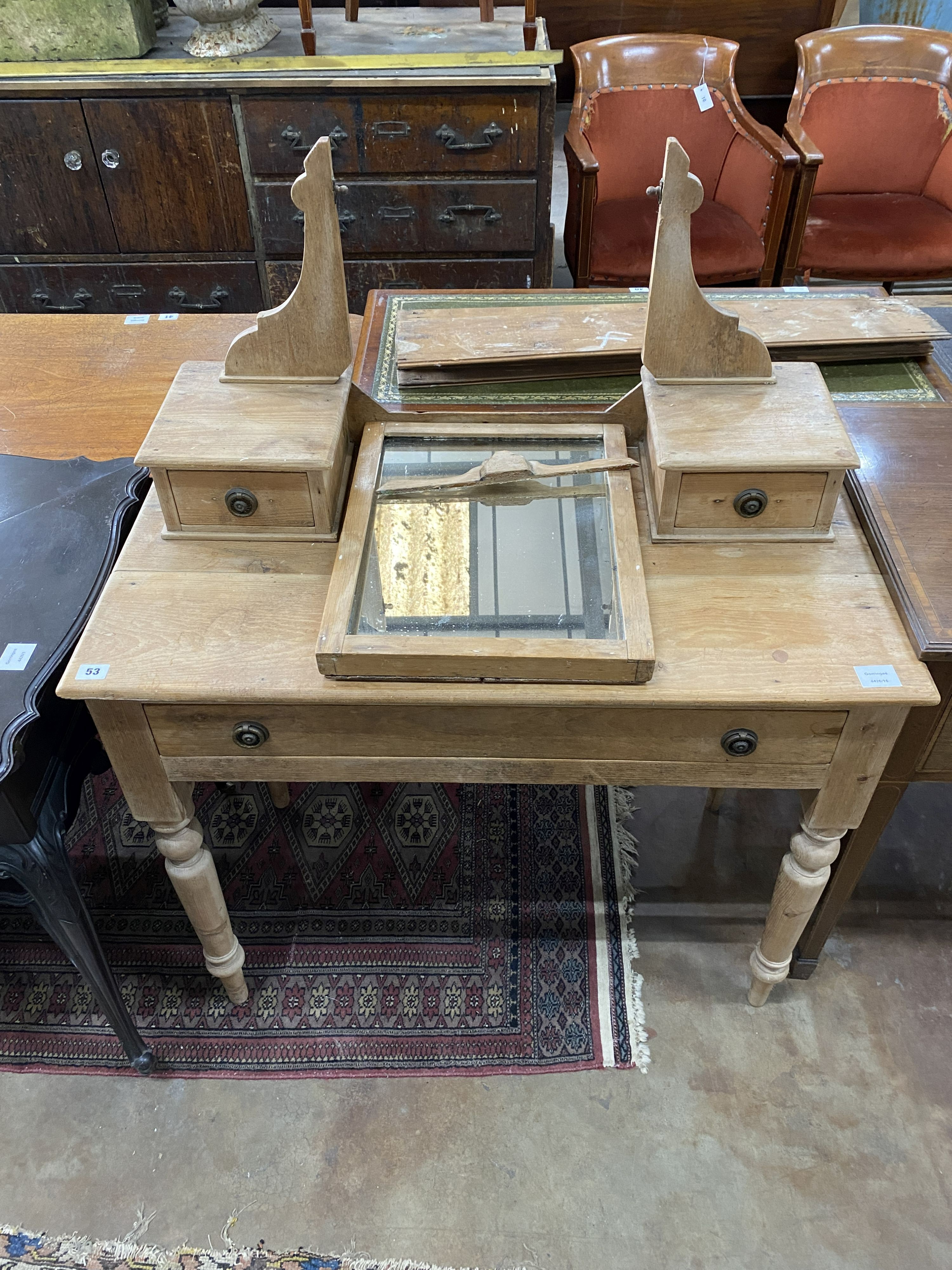 A Victorian pine dressing table, width 91cm, depth 47cm, height 130cm (mirror lacks fixings)